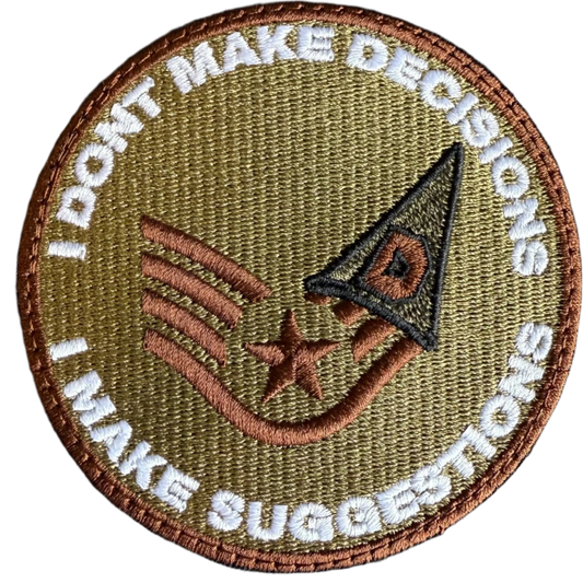 Patch with text 'I DON'T MAKE DECISIONS, I MAKE SUGGESTIONS' on a white background